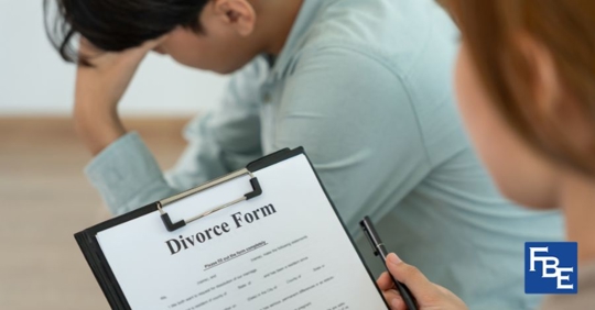 couple filling out divorce forms